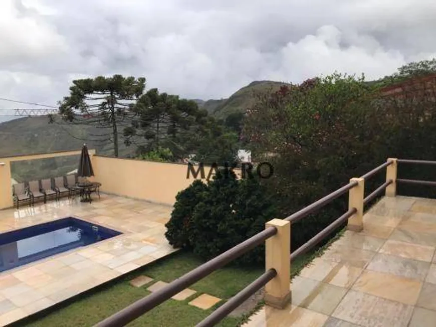 Foto 1 de Casa de Condomínio com 5 Quartos à venda, 430m² em Morro do Chapéu, Nova Lima