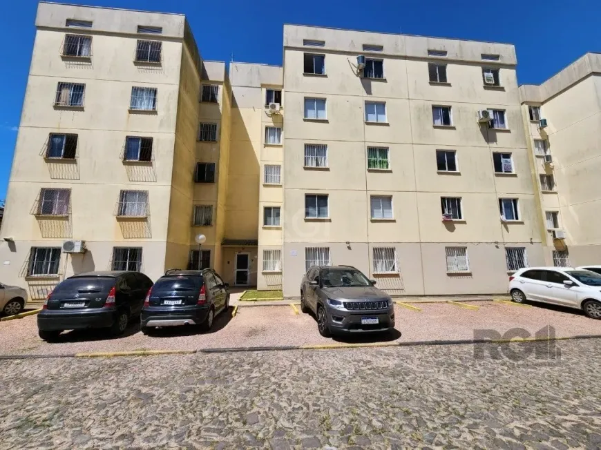 Foto 1 de Apartamento com 2 Quartos à venda, 45m² em Vila Nova, Porto Alegre