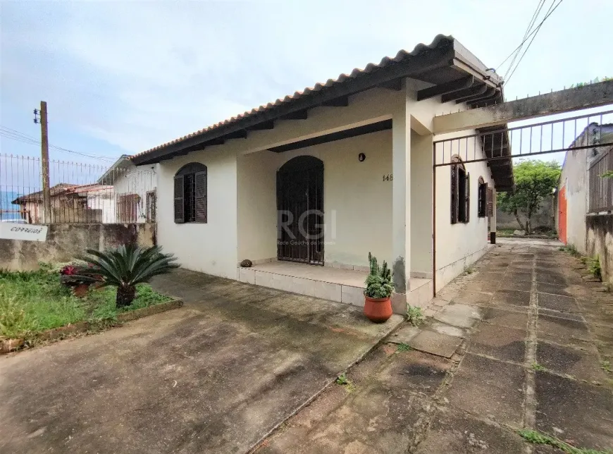 Foto 1 de Casa com 2 Quartos à venda, 91m² em Passo das Pedras, Porto Alegre