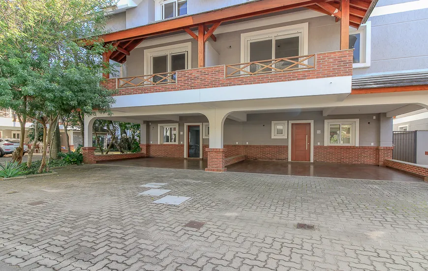 Foto 1 de Casa de Condomínio com 3 Quartos à venda, 242m² em Tristeza, Porto Alegre