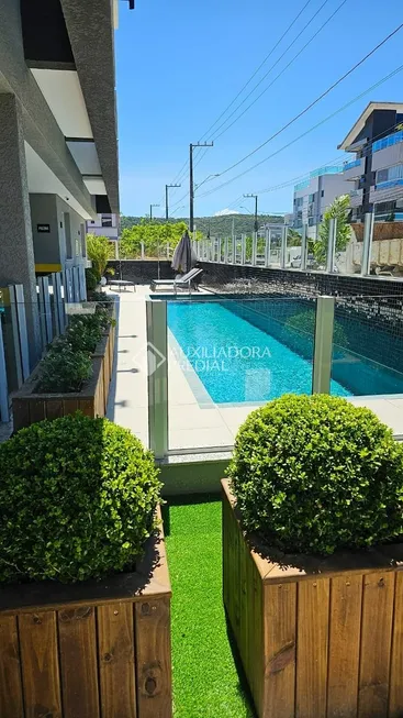 Foto 1 de Apartamento com 2 Quartos à venda, 63m² em Ingleses do Rio Vermelho, Florianópolis
