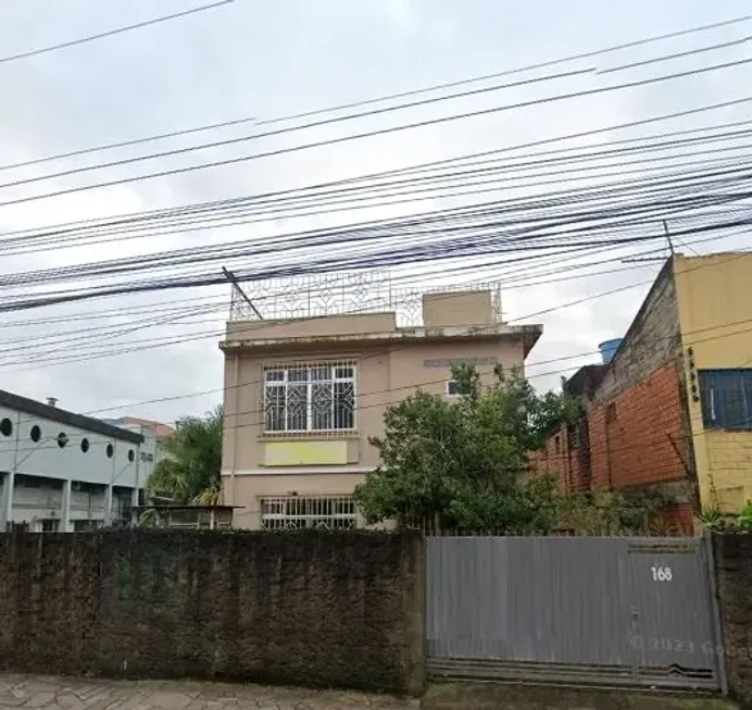 Foto 1 de Sobrado com 3 Quartos à venda, 435m² em São Geraldo, Porto Alegre