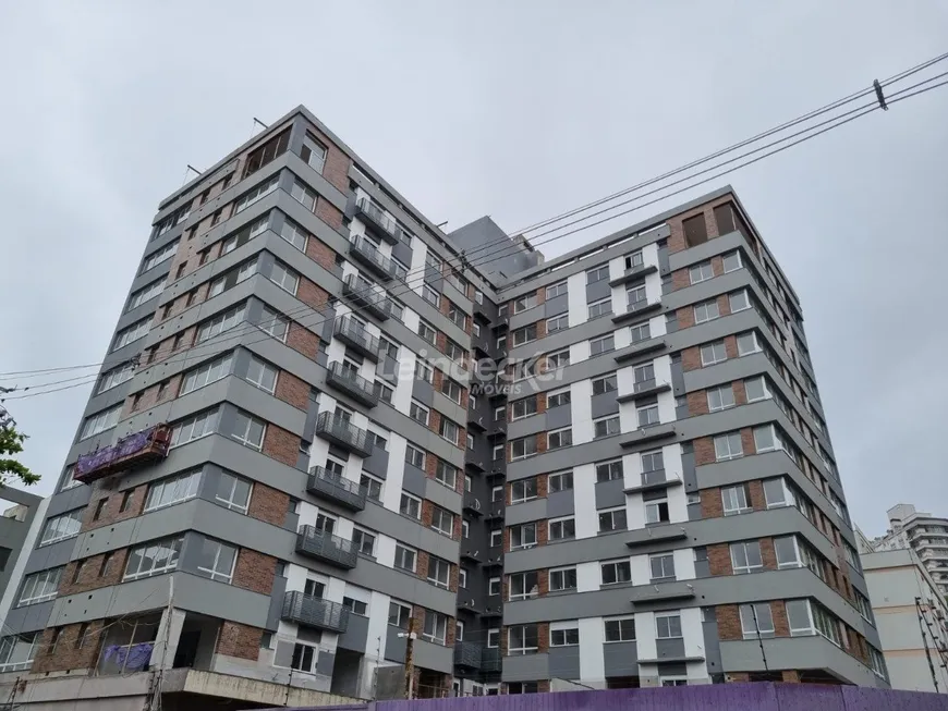 Foto 1 de Apartamento com 2 Quartos à venda, 70m² em Moinhos de Vento, Porto Alegre