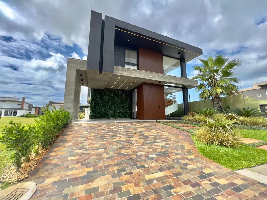 Foto 1 de Casa de Condomínio com 5 Quartos à venda, 320m² em Condominio Capao Ilhas Resort, Capão da Canoa