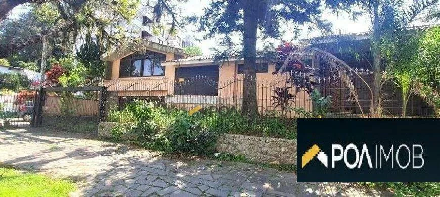 Foto 1 de Casa com 4 Quartos para alugar, 450m² em Jardim Lindóia, Porto Alegre