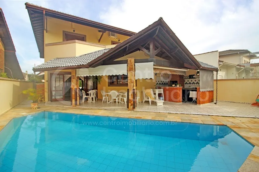 Foto 1 de Casa de Condomínio com 5 Quartos à venda, 332m² em Bougainvillee I , Peruíbe