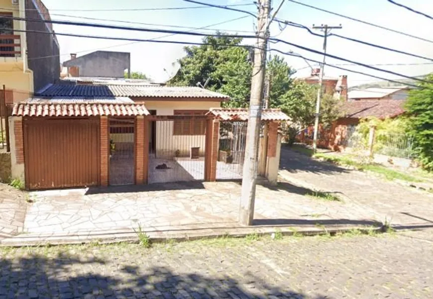 Foto 1 de Casa com 2 Quartos à venda, 202m² em Vila Nova, Porto Alegre