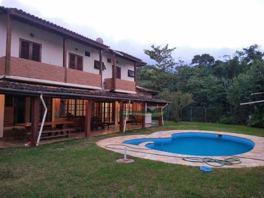 Foto 1 de Sobrado com 5 Quartos à venda, 360m² em Reserva du Moullin, São Sebastião