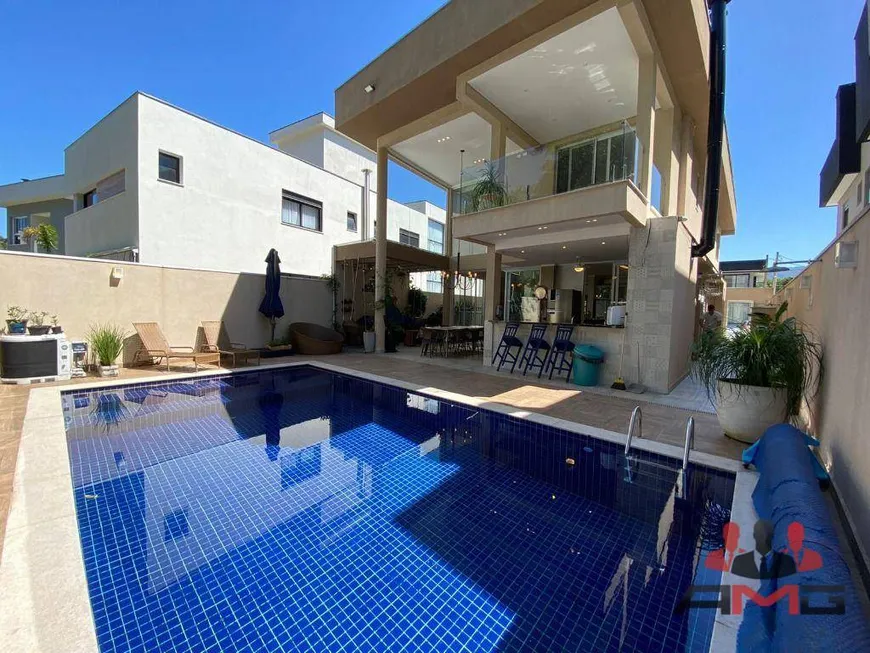 Foto 1 de Casa com 5 Quartos à venda, 300m² em Riviera de São Lourenço, Bertioga