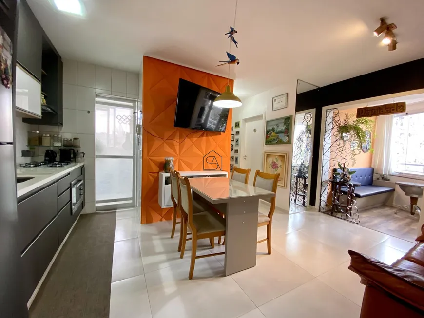 Foto 1 de Apartamento com 2 Quartos à venda, 62m² em Roçado, São José