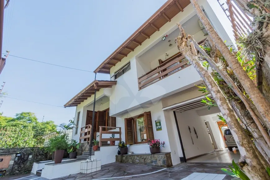 Foto 1 de Casa com 4 Quartos à venda, 200m² em Vila Ipiranga, Porto Alegre