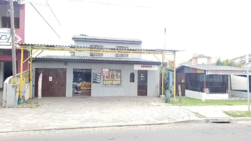 Foto 1 de Casa com 4 Quartos à venda, 204m² em Restinga, Porto Alegre