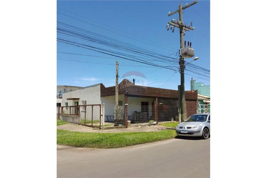 Foto 1 de Casa com 5 Quartos à venda, 200m² em Zona Nova, Capão da Canoa