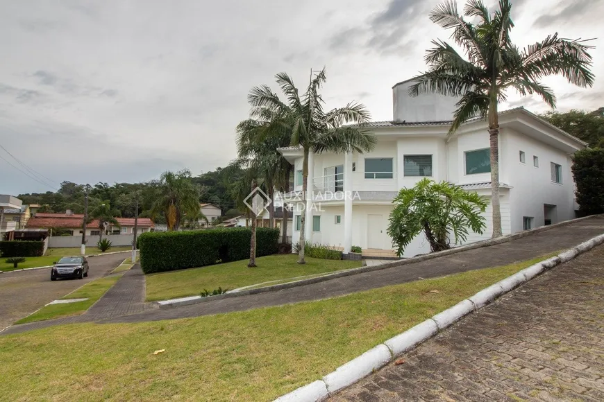 Foto 1 de Casa de Condomínio com 4 Quartos à venda, 484m² em Cacupé, Florianópolis
