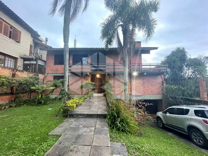 Foto 1 de Casa com 3 Quartos para alugar, 231m² em Menino Deus, Porto Alegre