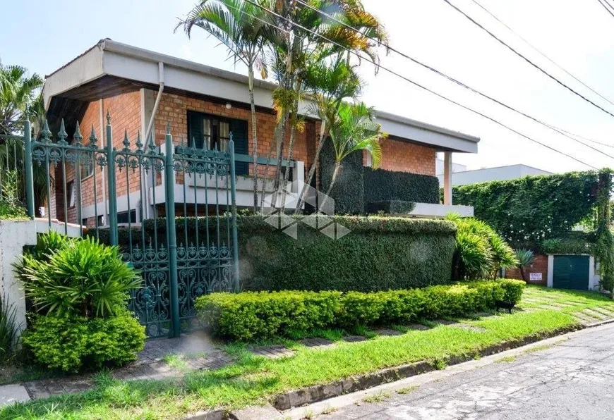 Foto 1 de Casa com 5 Quartos à venda, 680m² em Cidade Jardim, São Paulo