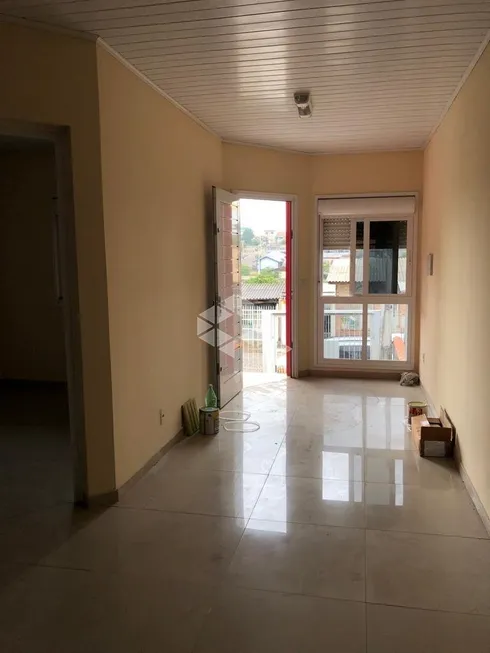Foto 1 de Casa com 2 Quartos à venda, 64m² em Auxiliadora, Gravataí