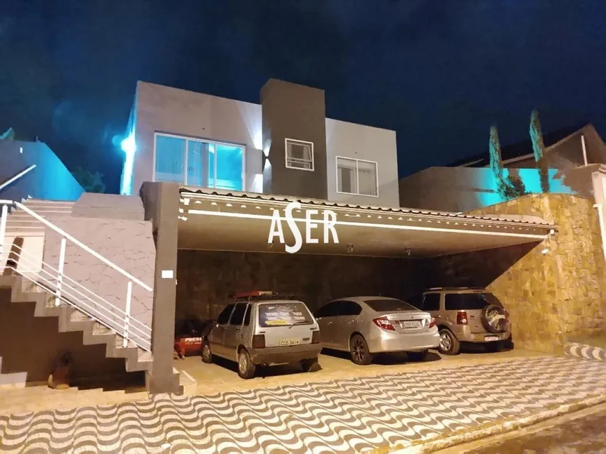 Foto 1 de Casa com 3 Quartos à venda, 200m² em Arujá Country Club, Arujá