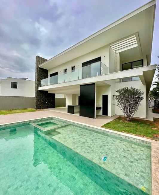 Foto 1 de Casa de Condomínio com 5 Quartos à venda, 496m² em Alphaville Flamboyant, Goiânia