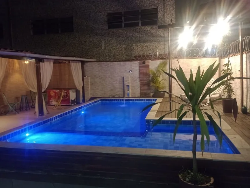 Foto 1 de Casa com 4 Quartos à venda, 217m² em Macuco, Santos