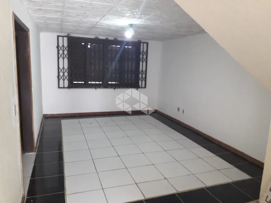 Foto 1 de Casa com 3 Quartos à venda, 240m² em Santo Antônio, Porto Alegre