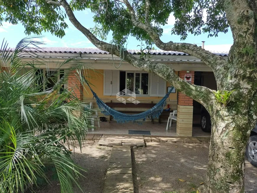 Foto 1 de Casa com 4 Quartos à venda, 137m² em Praia Curumim, Capão da Canoa