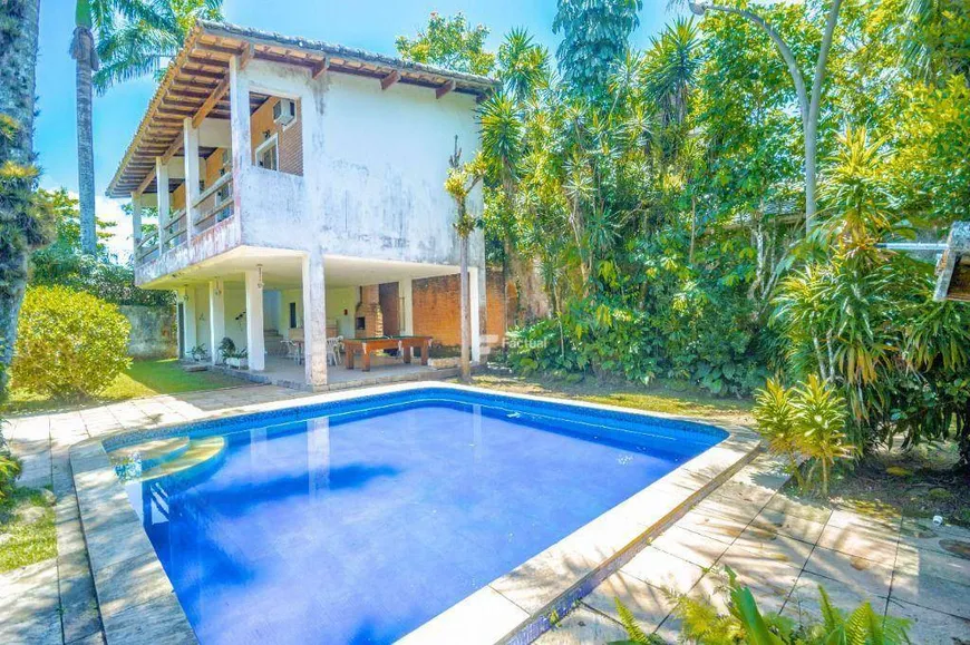 Foto 1 de Casa de Condomínio com 5 Quartos à venda, 156m² em Balneário Praia do Perequê , Guarujá