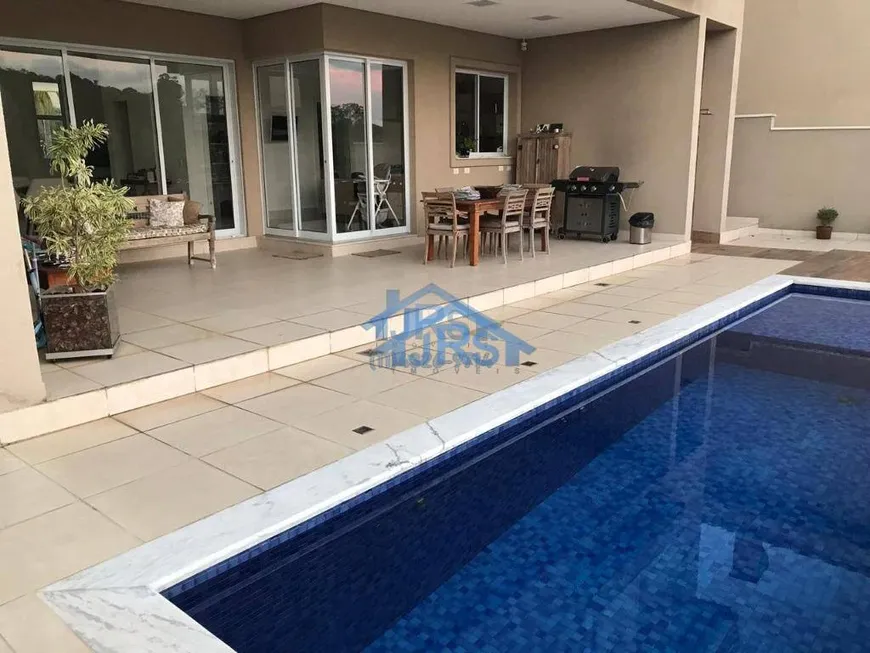 Foto 1 de Casa de Condomínio com 4 Quartos à venda, 400m² em Alphaville, Santana de Parnaíba