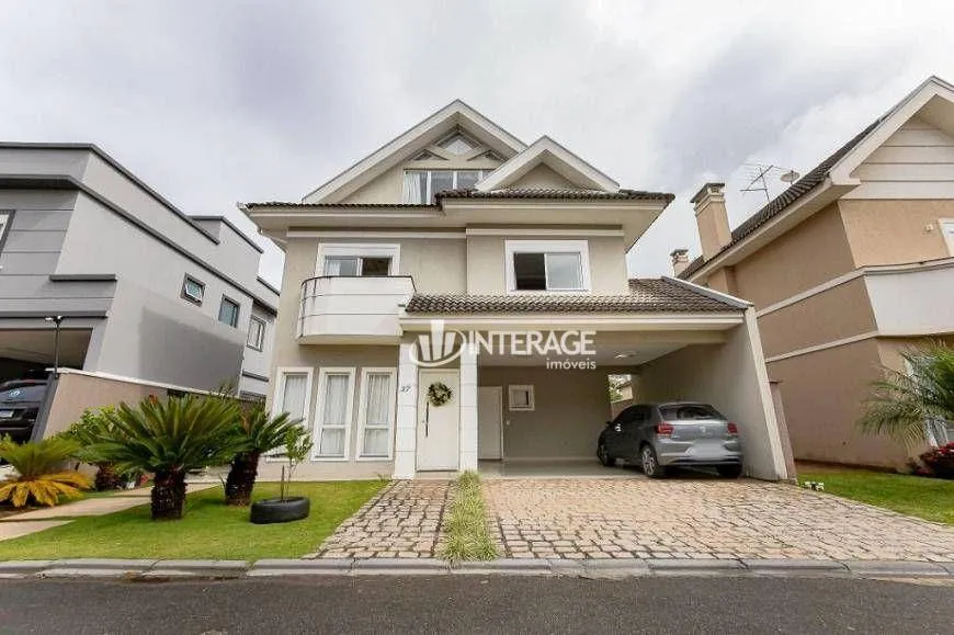 Foto 1 de Casa de Condomínio com 4 Quartos à venda, 290m² em Santa Felicidade, Curitiba