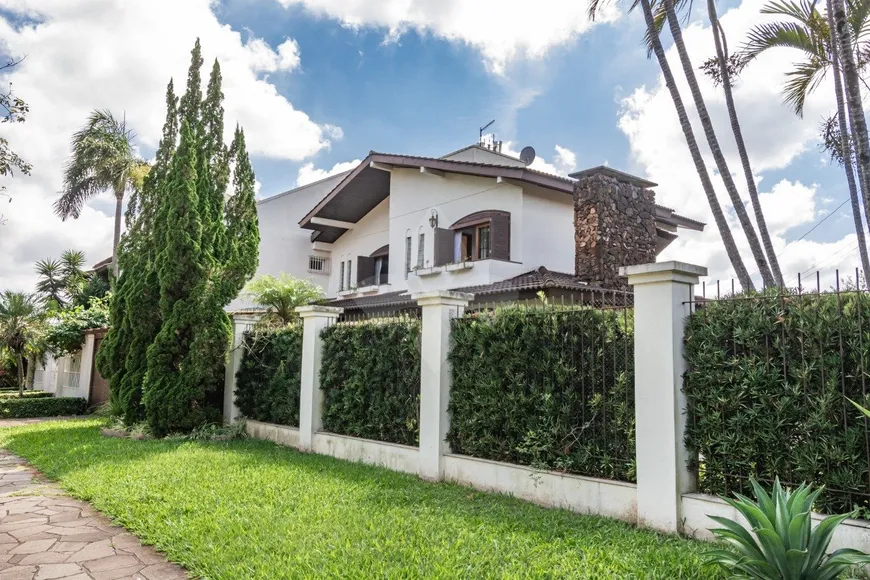 Foto 1 de Casa com 3 Quartos à venda, 323m² em Três Figueiras, Porto Alegre