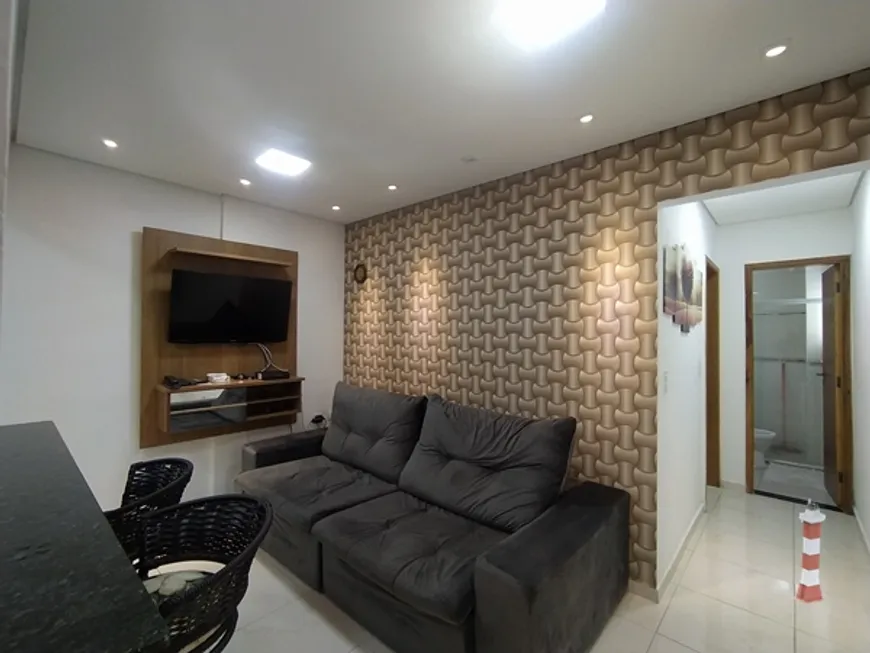 Foto 1 de Apartamento com 2 Quartos à venda, 53m² em Vila Voturua, São Vicente