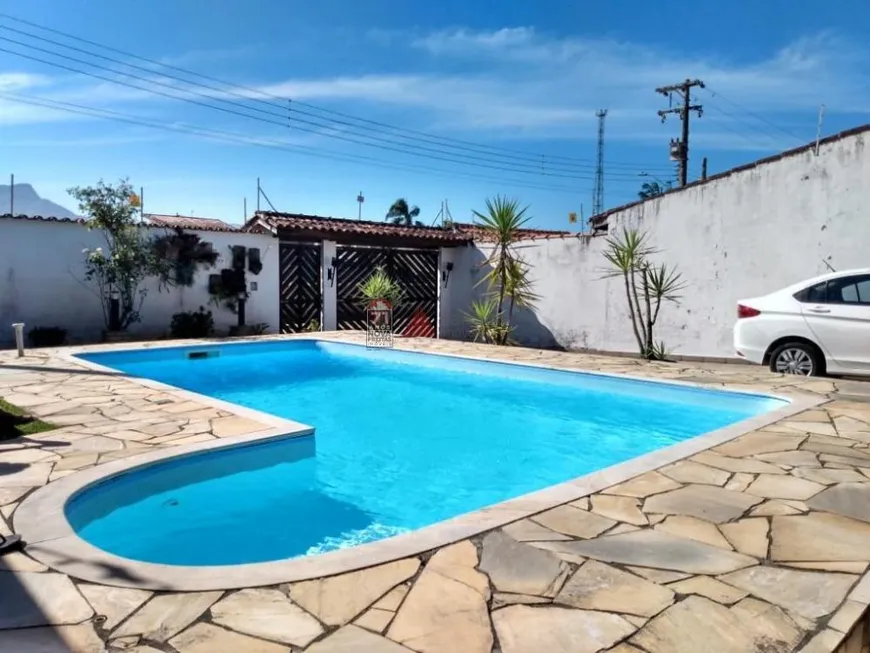 Foto 1 de Casa com 4 Quartos à venda, 160m² em Pontal de Santa Marina, Caraguatatuba
