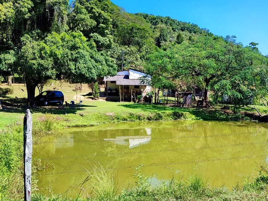Foto 1 de Fazenda/Sítio com 4 Quartos à venda, 65000m² em Zona Rural, Cachoeiras de Macacu