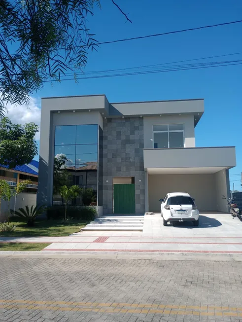 Foto 1 de Casa de Condomínio com 4 Quartos à venda, 461m² em Alphaville Jacuhy, Serra