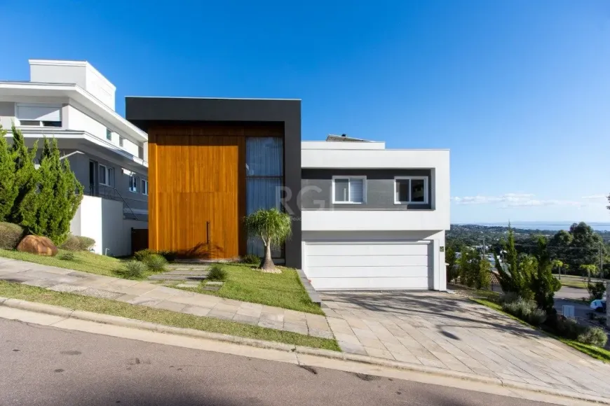 Foto 1 de Casa de Condomínio com 3 Quartos à venda, 339m² em Alphaville, Porto Alegre