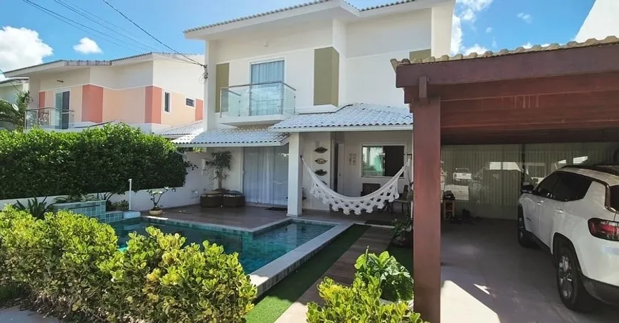 Foto 1 de Casa de Condomínio com 4 Quartos à venda, 260m² em Buraquinho, Lauro de Freitas