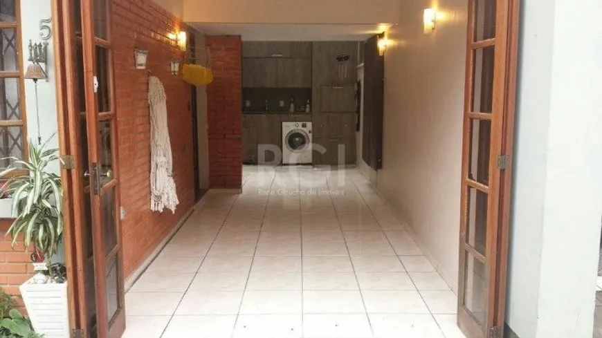 Foto 1 de Casa de Condomínio com 3 Quartos à venda, 116m² em Medianeira, Porto Alegre