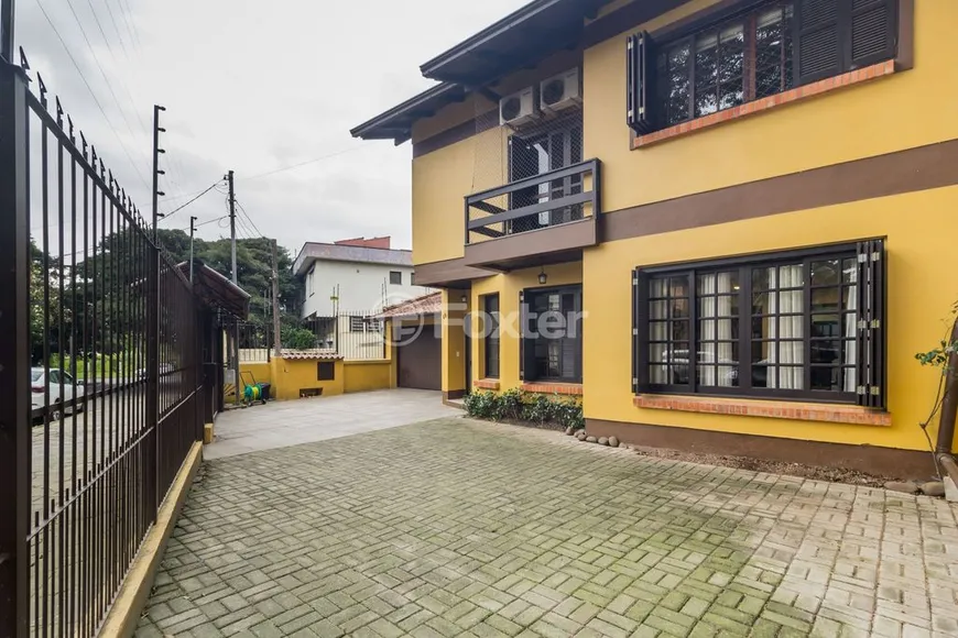 Foto 1 de Casa com 4 Quartos à venda, 300m² em Ipanema, Porto Alegre