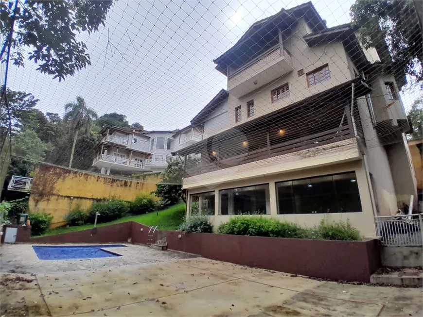 Foto 1 de Casa de Condomínio com 4 Quartos à venda, 257m² em Serra da Cantareira, Mairiporã