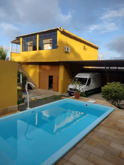 Foto 1 de Casa com 2 Quartos à venda, 220m² em Agronomia, Porto Alegre