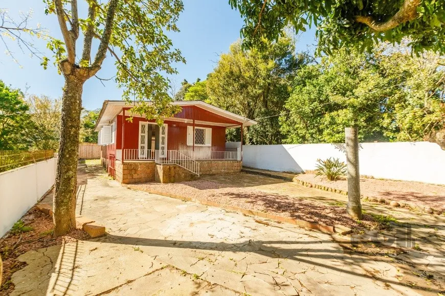 Foto 1 de Casa com 3 Quartos à venda, 130m² em Vila Nova, Porto Alegre