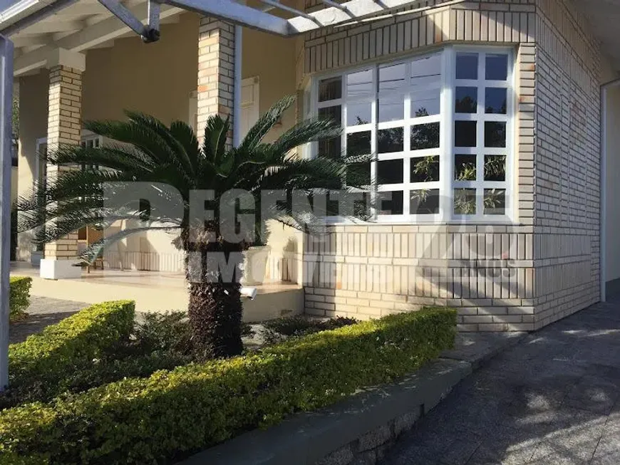 Foto 1 de Casa de Condomínio com 5 Quartos à venda, 310m² em Monte Verde, Florianópolis