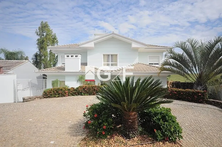 Foto 1 de Casa de Condomínio com 4 Quartos à venda, 601m² em Loteamento Caminhos de Sao Conrado Sousas, Campinas