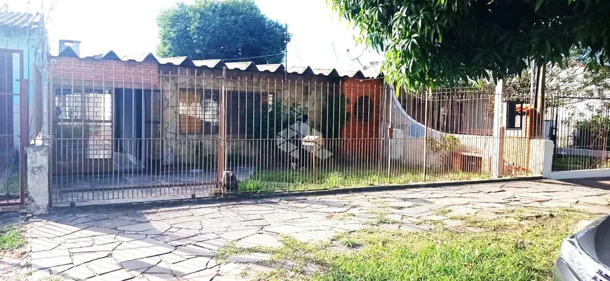 Foto 1 de Casa com 3 Quartos à venda, 100m² em Santa Fé, Porto Alegre