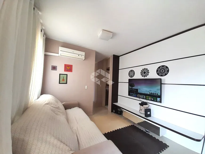 Foto 1 de Apartamento com 3 Quartos à venda, 67m² em Humaitá, Porto Alegre