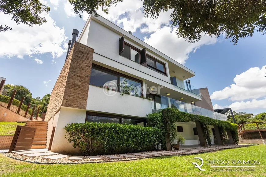 Foto 1 de Casa de Condomínio com 4 Quartos à venda, 493m² em Agronomia, Porto Alegre
