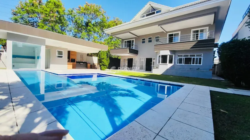 Foto 1 de Casa de Condomínio com 4 Quartos à venda, 545m² em Barra da Tijuca, Rio de Janeiro