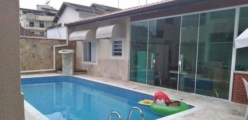 Foto 1 de Sobrado com 5 Quartos à venda, 350m² em Indaiá, Caraguatatuba