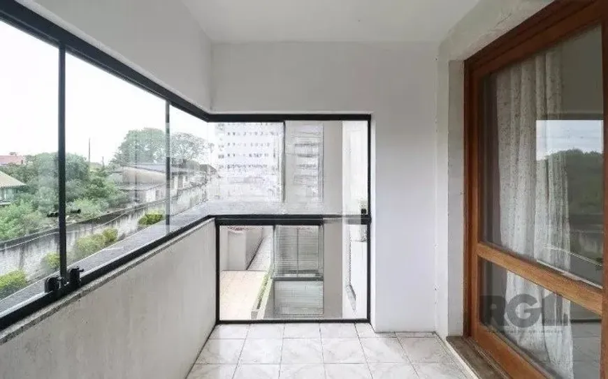 Foto 1 de Apartamento com 1 Quarto à venda, 51m² em Santo Antônio, Porto Alegre