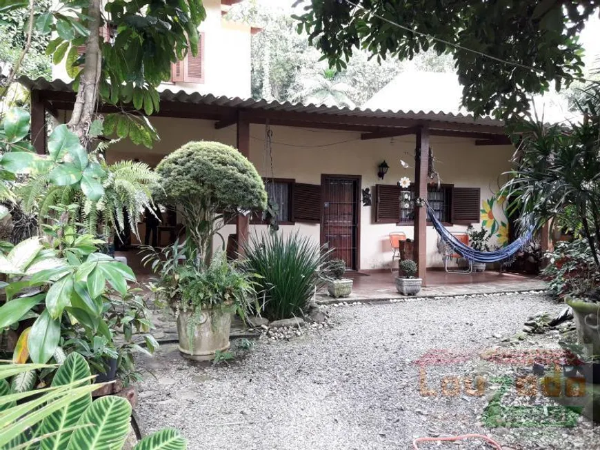 Foto 1 de Sobrado com 3 Quartos à venda, 360m² em Jardim Europa, Peruíbe